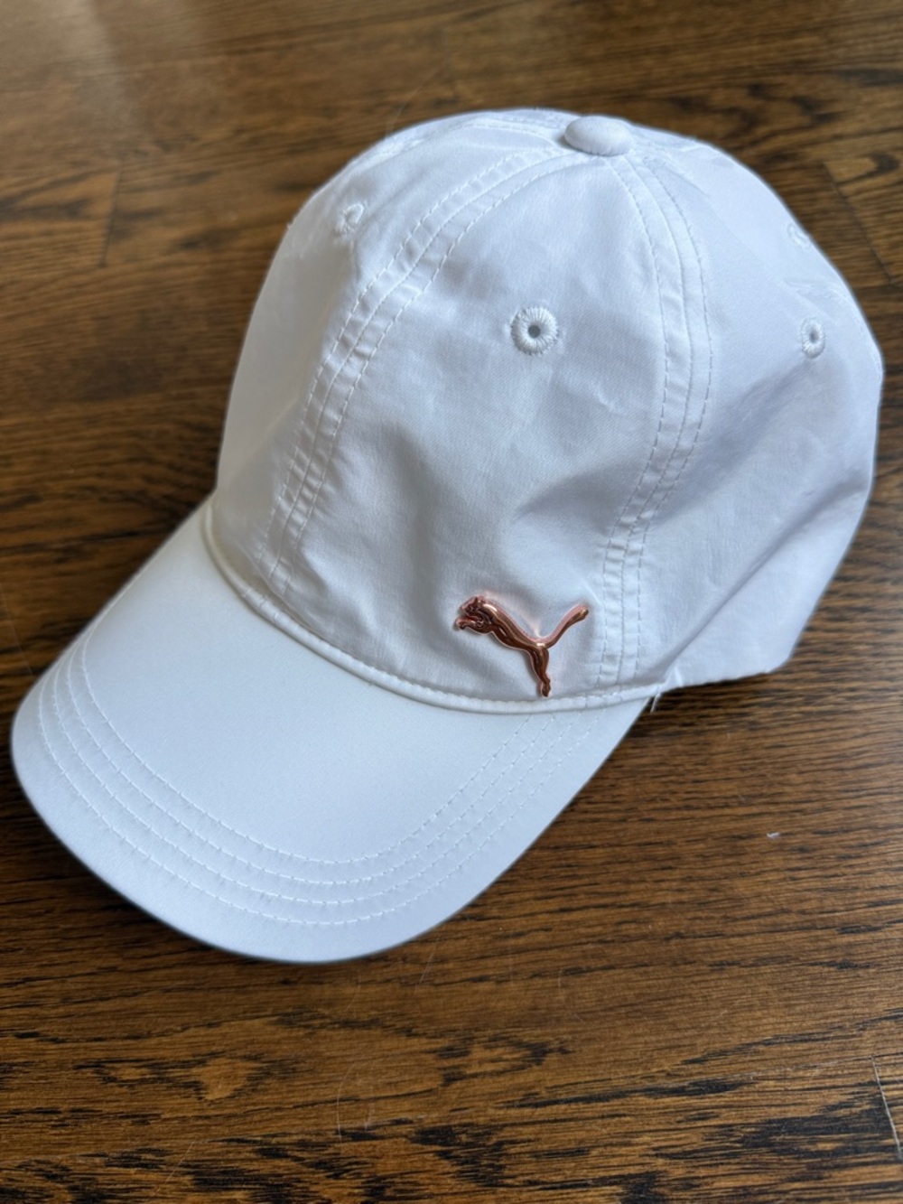 Puma White Women’s Tennis Cap with Rose Gold Puma Logo and Hardware